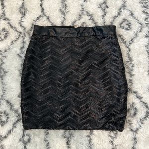 Sequined black mini skirt